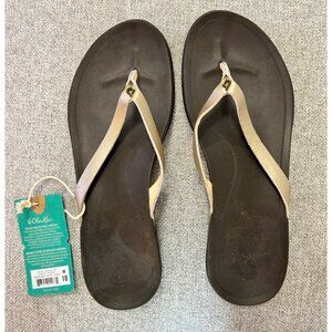Brown and Gold Olukai Flip Flops